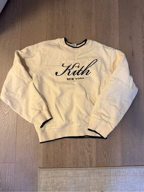 Kith Cream Crewneck Sweater with Dark Green Trim